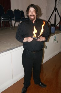 Magician Jonathan Usher with money burning a hole in his pocket